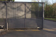 Sliding gate installation showing the bottom rollers with bolt ref 363, top guide roller plate  and gate motor with photo cells.